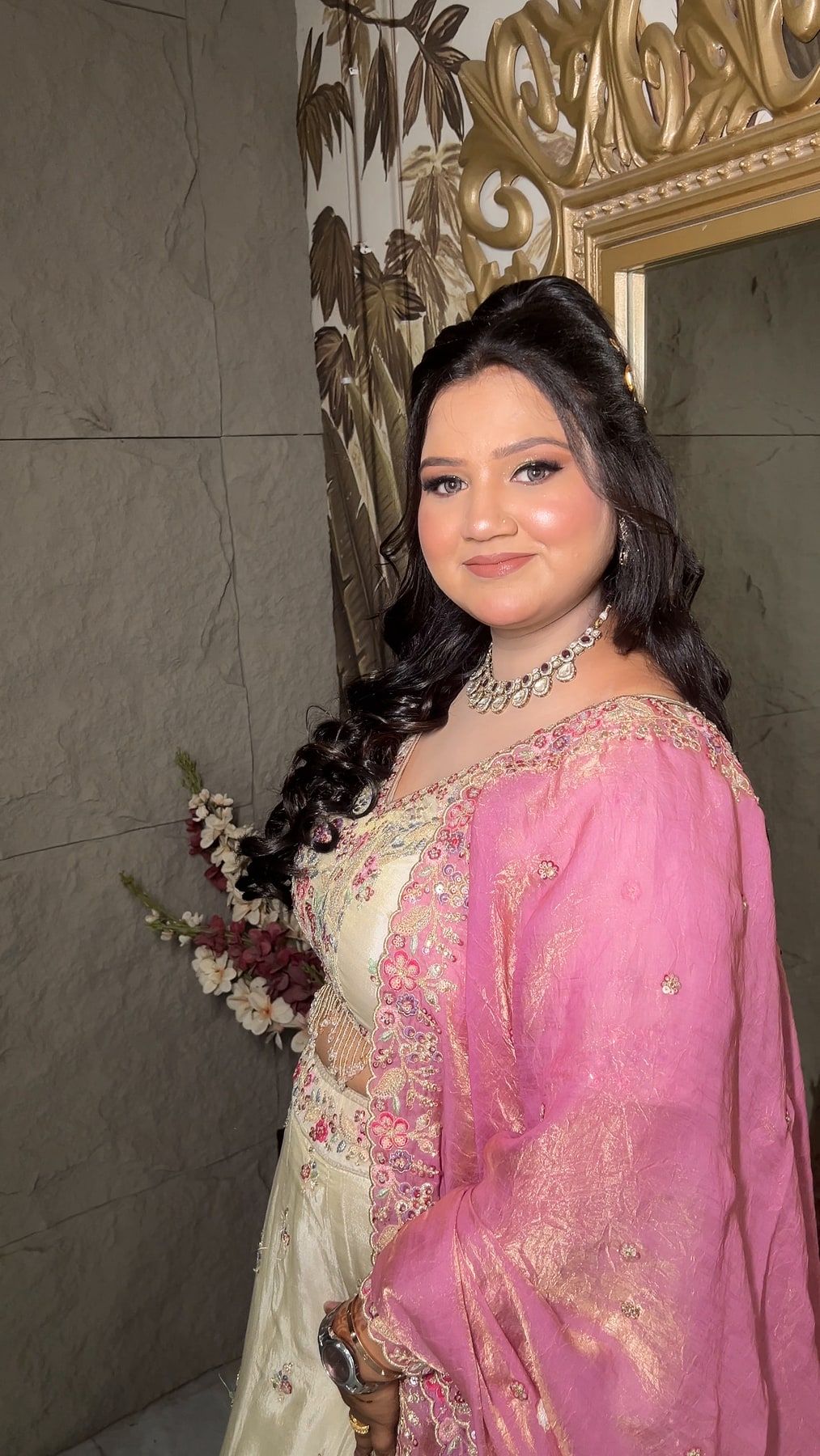 Engagement makeup look with pastel lehenga and soft curls, Faridabad