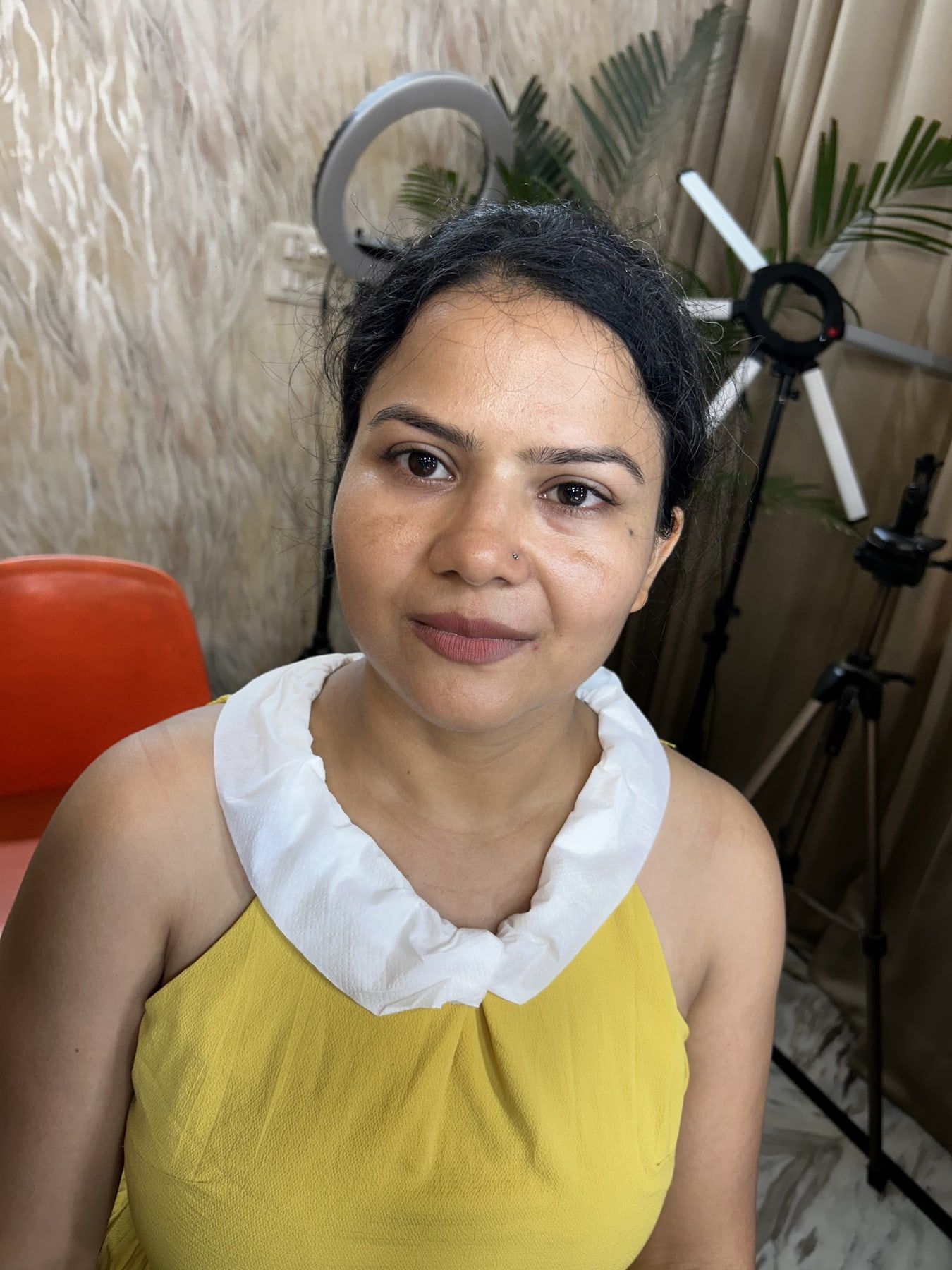 Client before party makeup — bare skin, no makeup